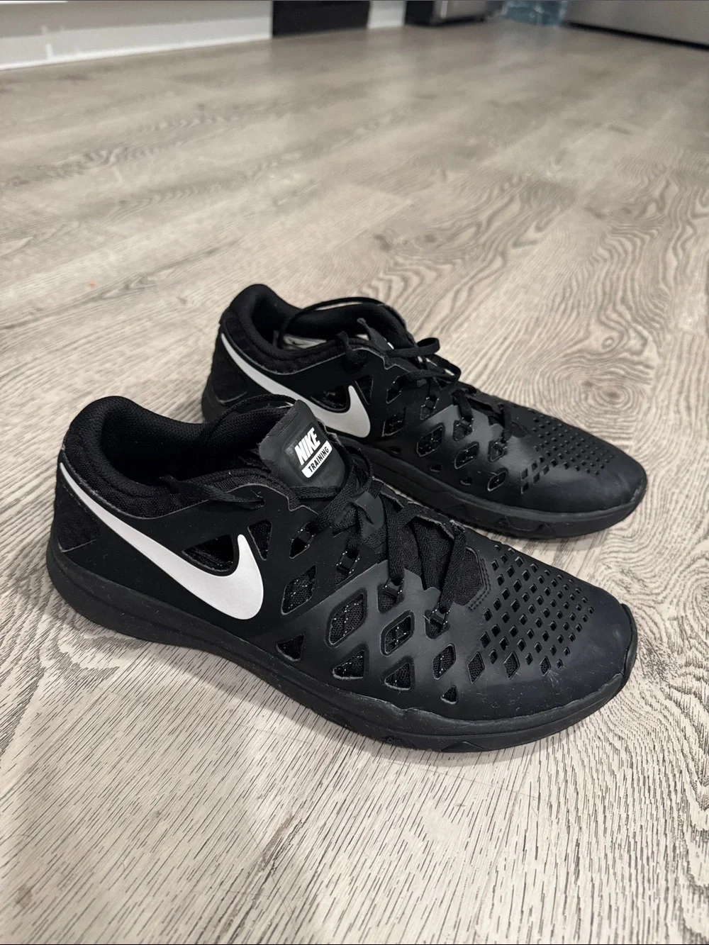 Nike Men’s Black Athletic Shoes with White Swoosh